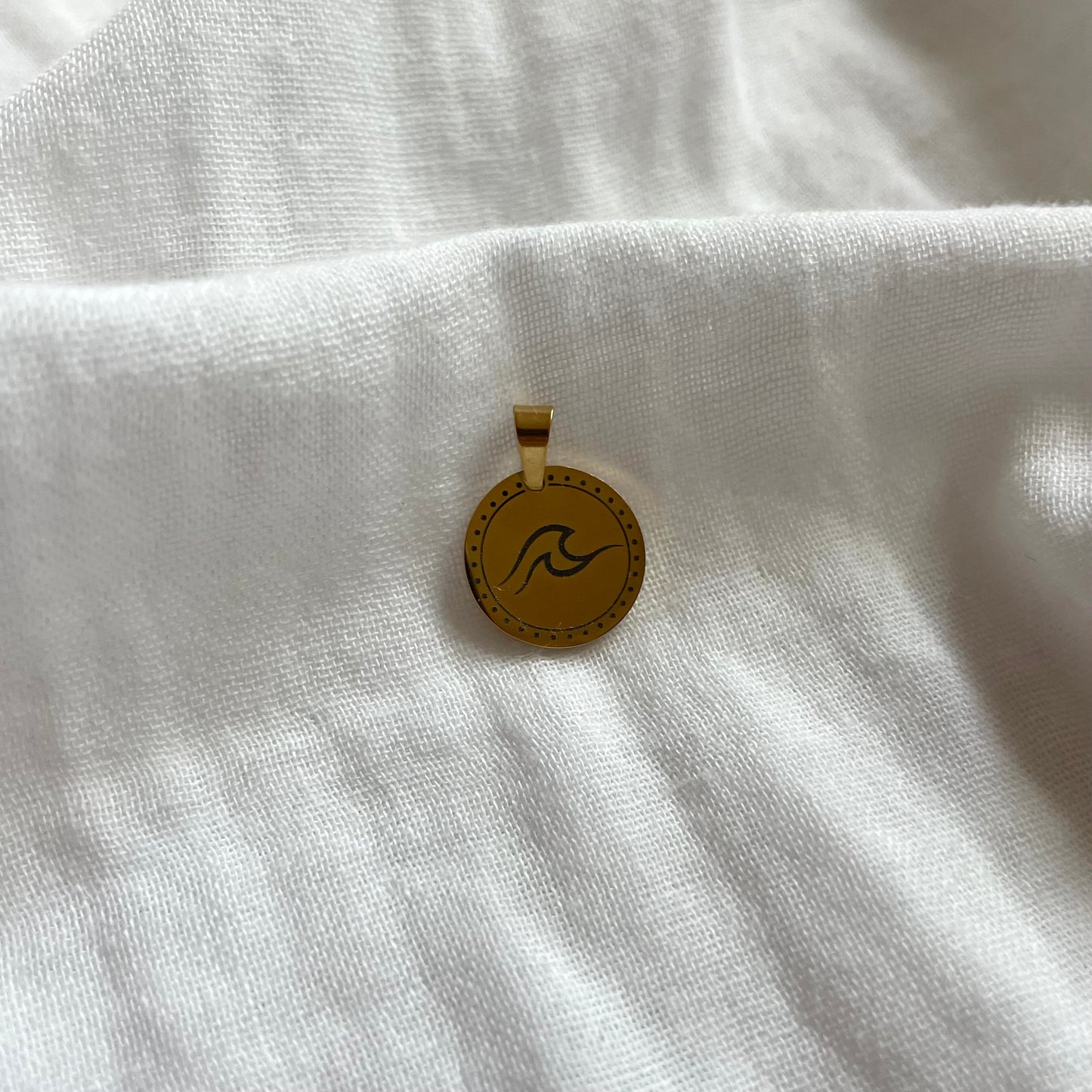 Charm: bedel met golf