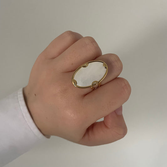 White oval ring