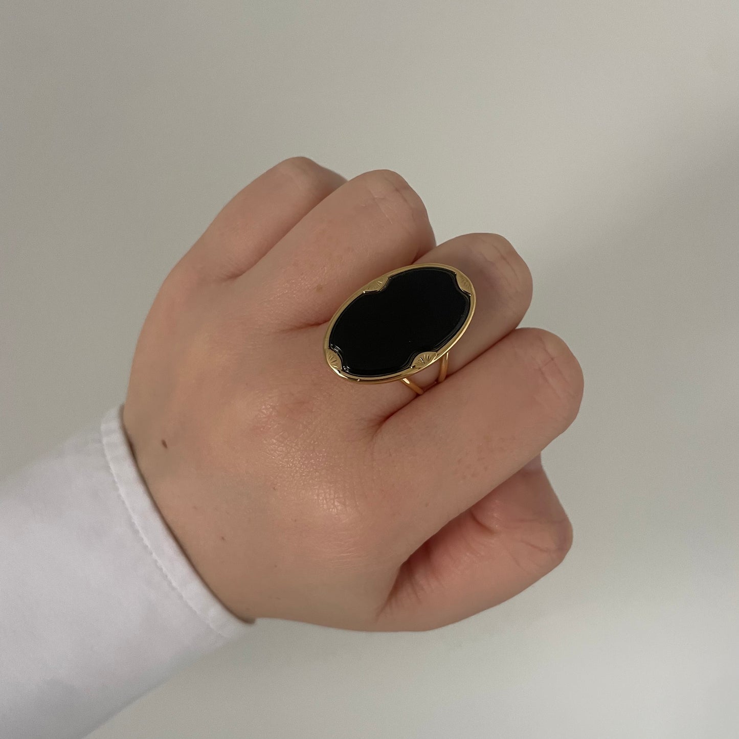 Black oval ring