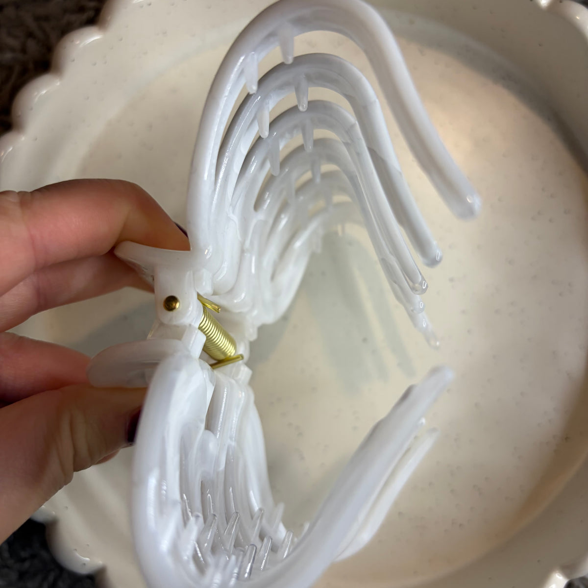 White hairclip