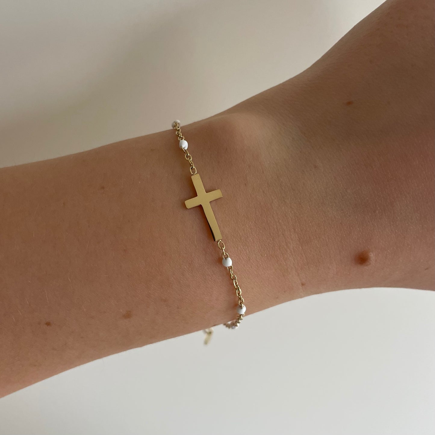 White cross bracelet